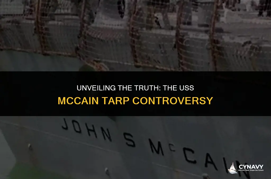 did the navy put a tarp over uss mccain name