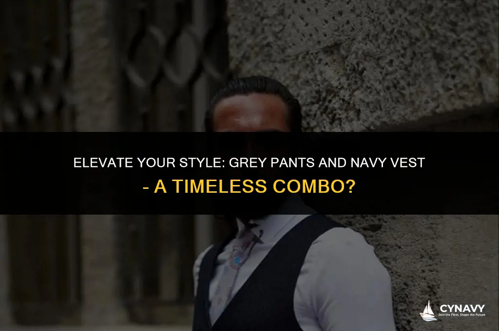 do grey pants and a navy vest look good together
