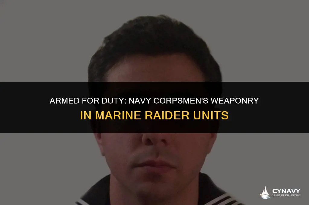 do navy corpman assigned to marine raider units carry weapons