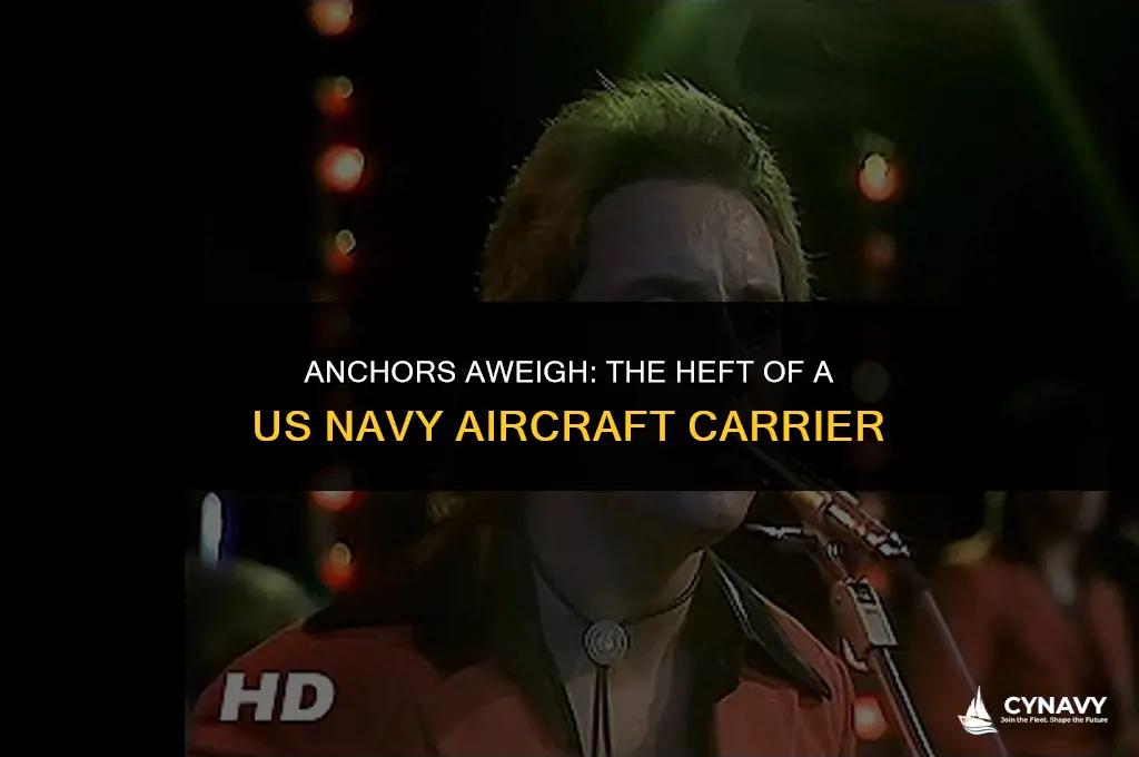 how much does a us navy aircraft carrier weigh