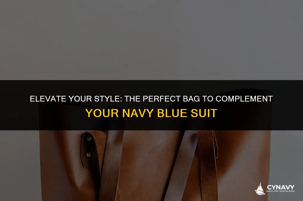what color bag goes with navy blue suit