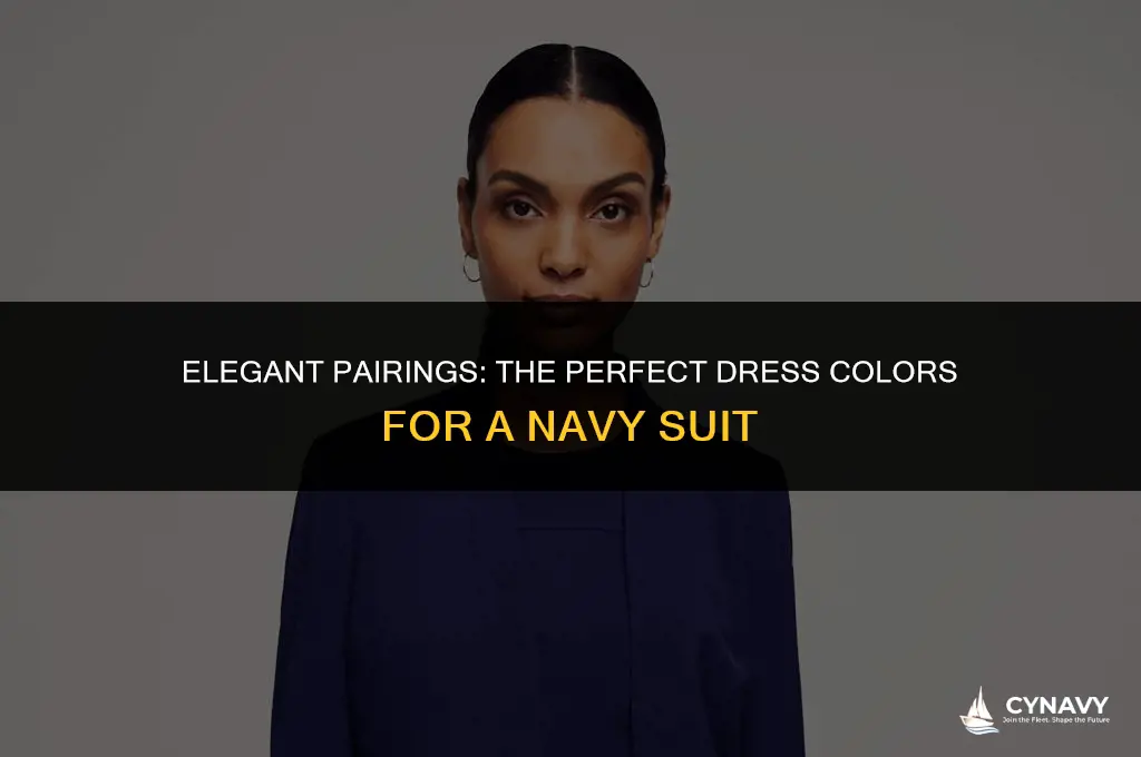 what color dress looks best with navy suit