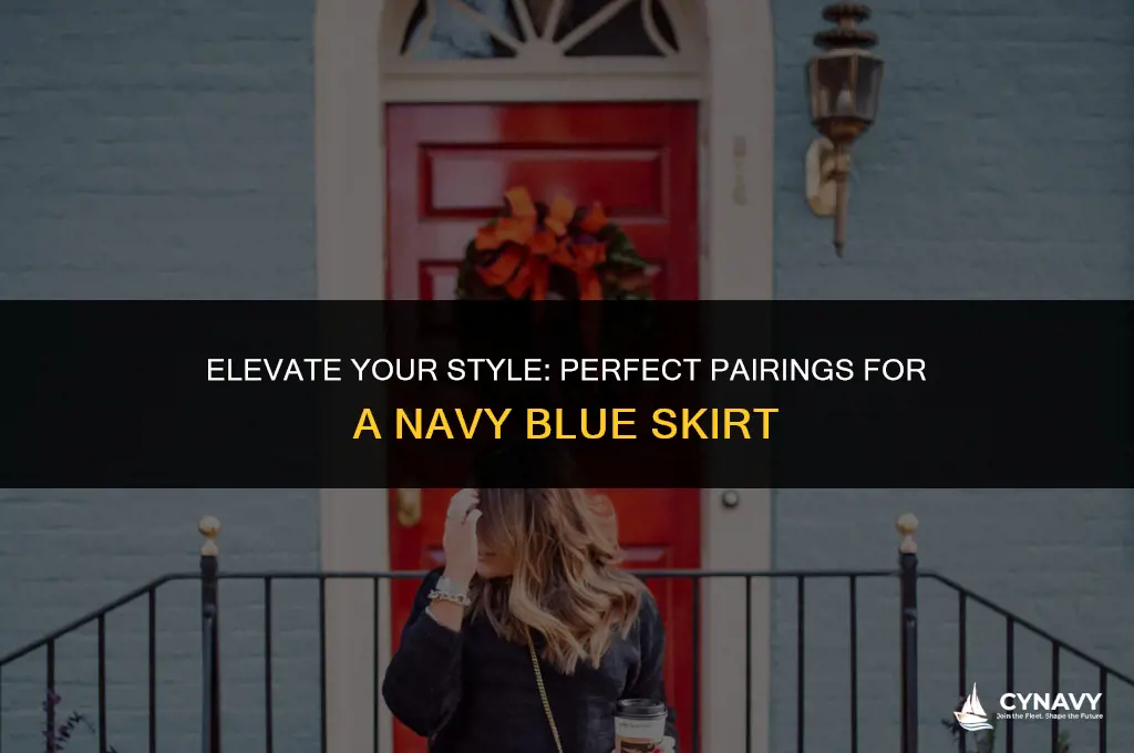 what goes with a navy blue skirt